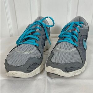 Nike 2 tone grey athletic shoes teal blue laces size 8. Hardly worn.